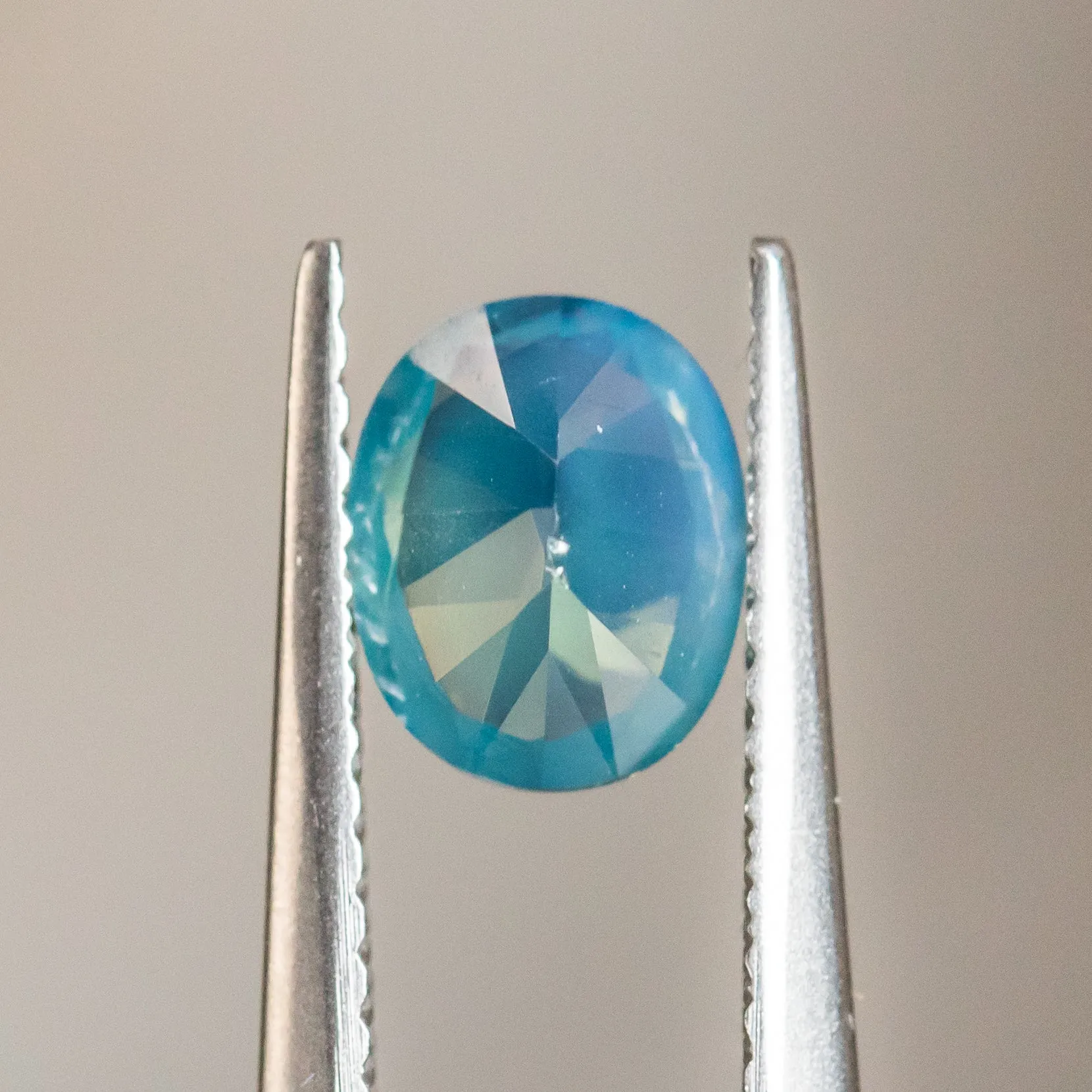 1.30CT OVAL GOMBE NIGERIAN SAPPHIRE, SILKY OPALESCENT TEAL, 6.98X5.66X4.02MM, UNTREATED