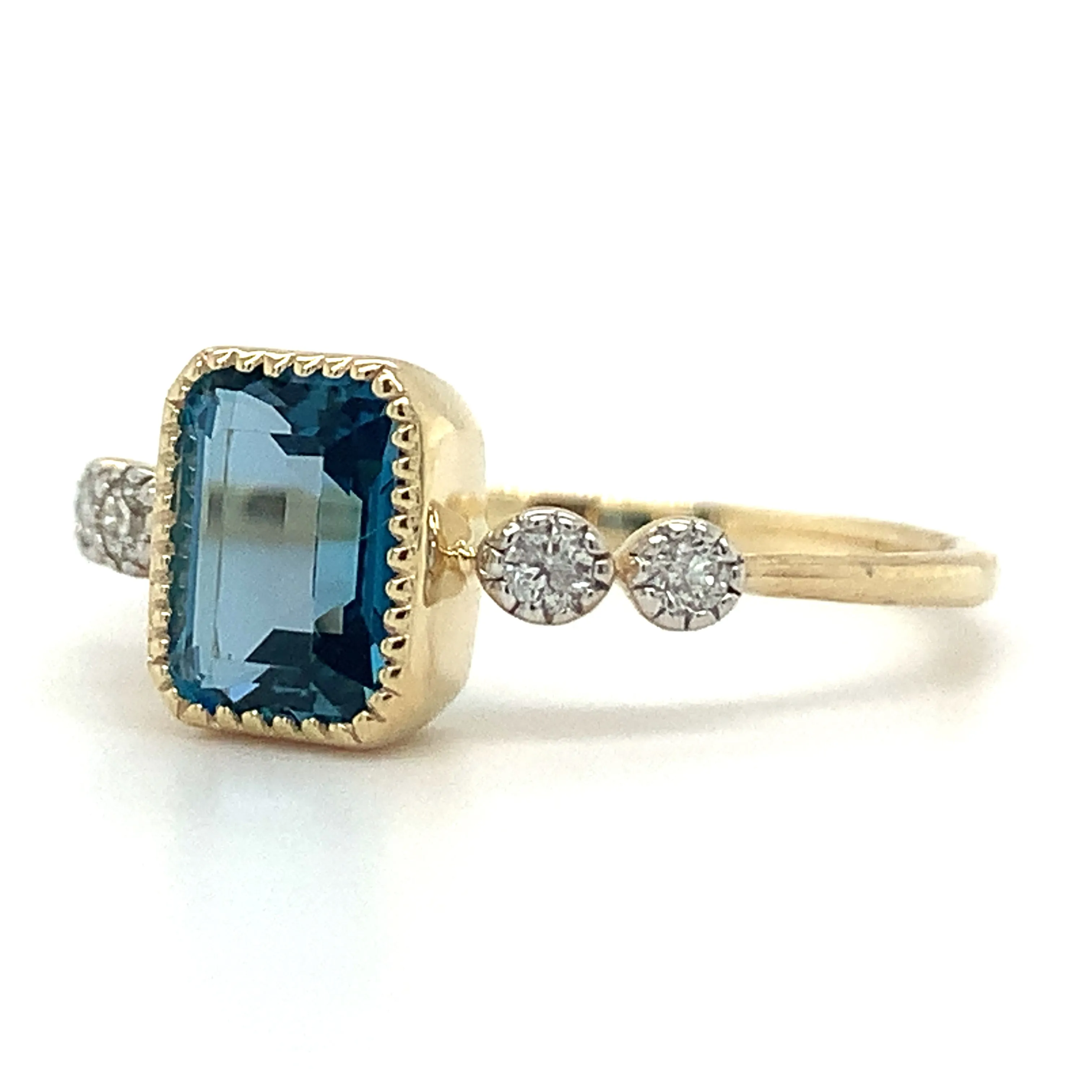 9ct Yellow Gold 1.32ct Emerald Cut London Blue Topaz Ring with Side Diamonds