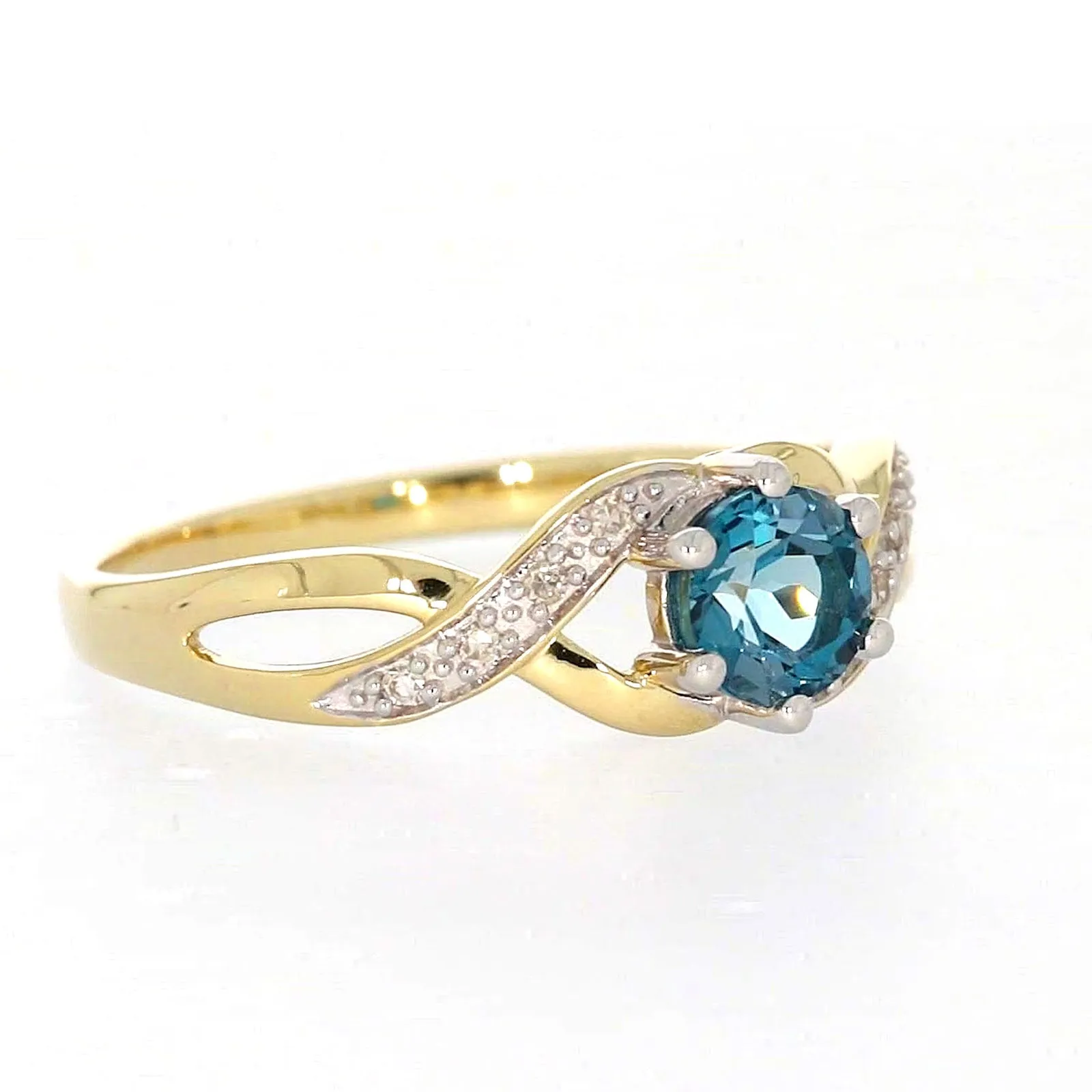 9ct Yellow Gold Round Brilliant Cut Blue Topaz Diamond Set Ring