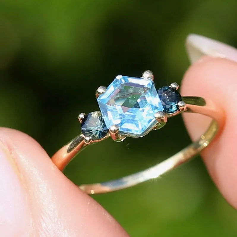 Hexagonal Blue Topaz and Parti Sapphire Trilogy, 9ct Yellow Gold, size O or 7.25