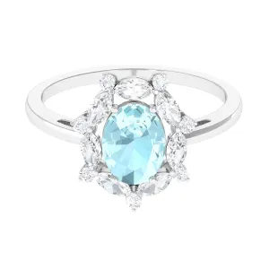 Oval Sky Blue Topaz Designer Halo Engagement Ring with Moissanite